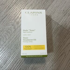 Clarins Yellow and White Recyclable Packaging